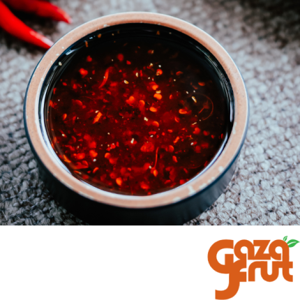 Salsa de ají fresca y natural en frasco, ideal para carnes, guisos y acompañamientos.